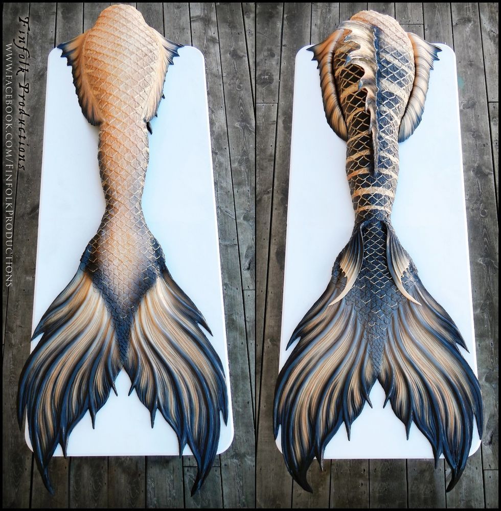 Finfolk Productions Silicone Mermaid Tail - Black & Gold Calypso  Wow what an awesome tail for that lucky $$ Mer