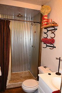 Galvanized tin shower!! Maybe for the attic?  Towel rack is horseshoes