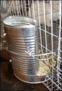 Great DIY feeder for rabbit cages. Still needs a cover if used outside to prevent rainwater entering.