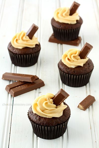 Sinful Kit Kat Cupcakes with Caramel Buttercream Frosting are guaranteed to put a smile on your face.