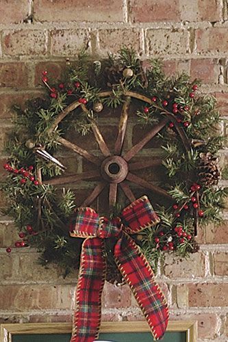 Turn antique wagon wheel into a holiday wreath!