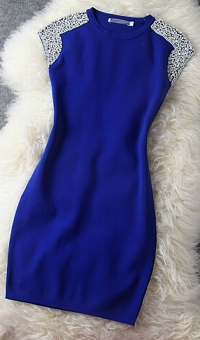 Blue beaded dress, perfect for formal occasions.
