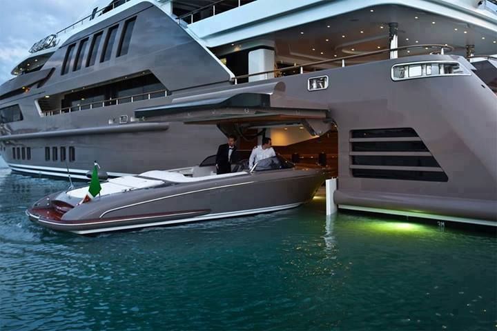 Luxury Yacht..I totally want a yacht with a garage for a speed boat on the side.