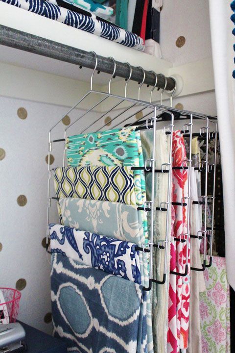 Such a sensible and inexpensive way to store fabric! I have a bunch of these hangers around the house. Now I just need the closet