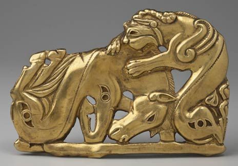 Belt plaque: battle between a monster and a horse, Siberia, 4th-3rd C. BCE Chased gold.
