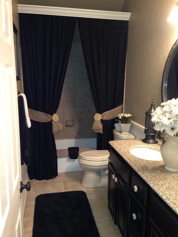 Master bathroom idea -curtains to normal ceiling heighth but just shy of these angled high ceiling. Cap the rods with a molding