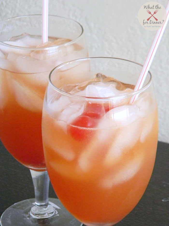 Safe Sex on the Beach Mocktail (3 oz cranberry juice 3 oz grapefruit juice 2 oz peach nectar 1 maraschino cherry)