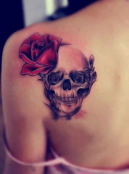 Upper Back Tattoos: Skull Rose Tattoos for Girls, this would be possibly the one of the few skull tattoos i would get