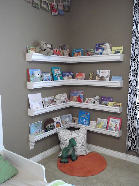 What kid wouldnt love a “book nook” in their bedroom?!  Instead of shelving, use plastic rain gutters from Home Depot