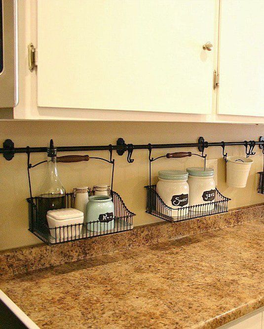 #25. Use your backsplash to store things that would otherwise be taking up valuable counter space! | 29 Sneaky Tips For Small