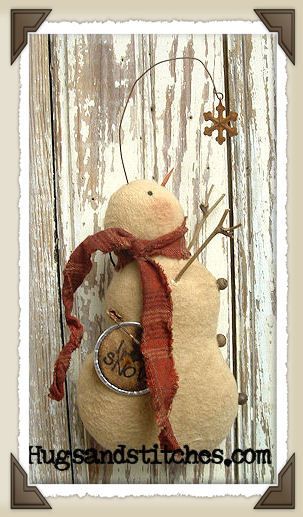 Catching Snowflakes made from grunged flannel with a homespun scarf and stick arms.