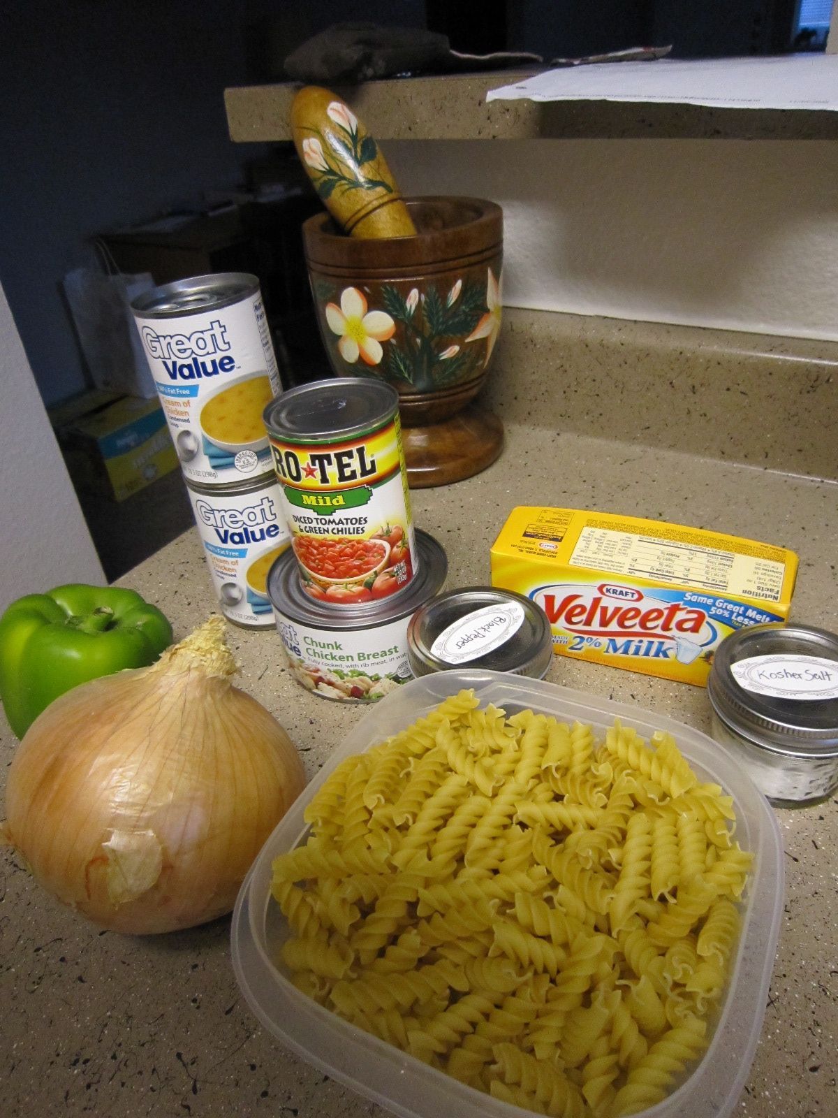 Cheesy Chicken N Noodles  Cream of chicken soup  cream of mushroom soup  some chopped/shredded chicken  canned diced tomatoes