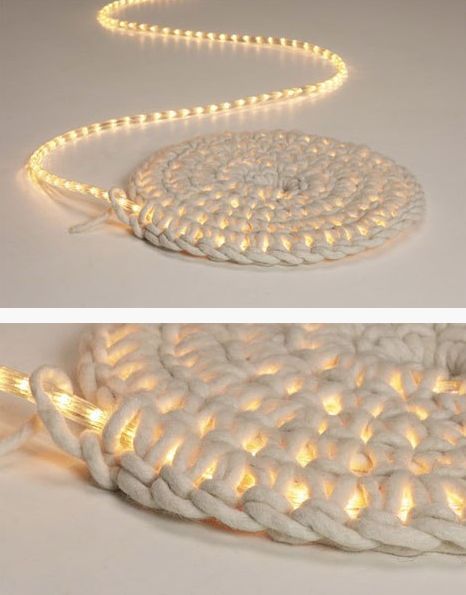 Crochet around a rope light to create a light-up rug. Great for a covered patio outside at night.