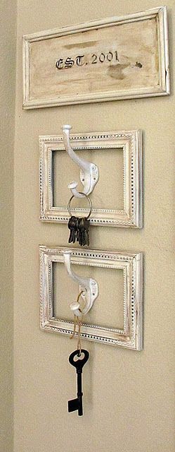Cute idea for keys, purses, etc.  All you need is hooks, frames, and spray paint.  Great idea.