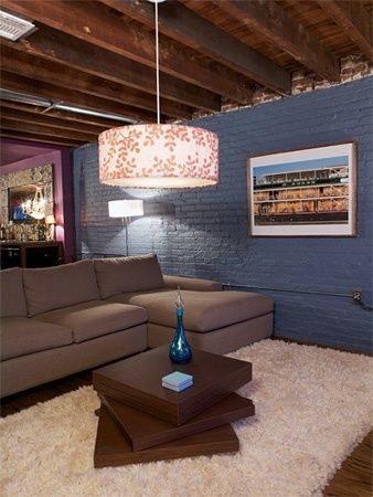 “Finishing a Basement on a Budget” – I would love to do this to my basement — put down laminate “wood” floors or put epoxy on the
