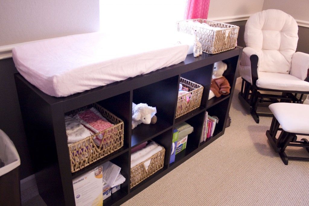 Genius! Cube organizer as a changing table! Perfect for once they out grow the changing pad!