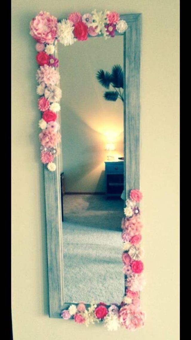 really cute and simple mirror idea. take your mirror and connect false flowers to the corners or all around. whatever you please!
