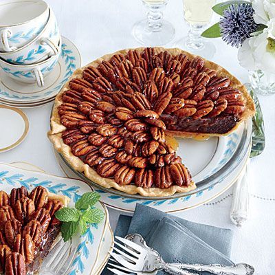 Salted Caramel-Chocolate Pecan Pie | A cross between a fudge pie and pecan pie, this is all the more stunning if you arrange the