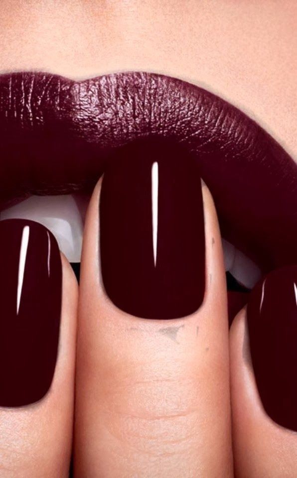 Burgundy nail polish and lips stick