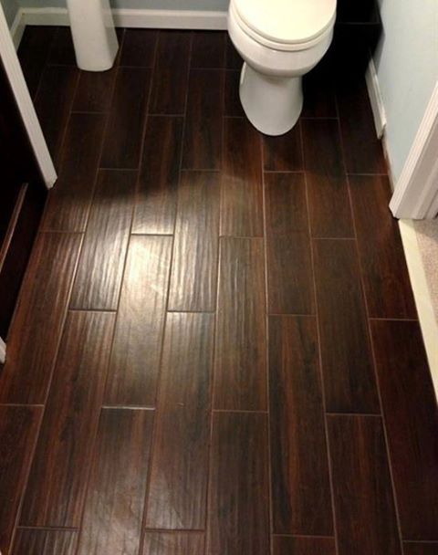 ceramic tile that looks like hard wood flooring!  In the living room, entry way, dining room and hallways.
