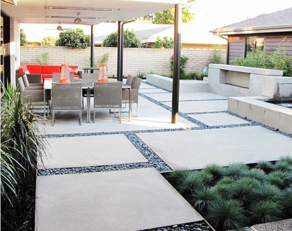 Large concrete slab and pebble patio design