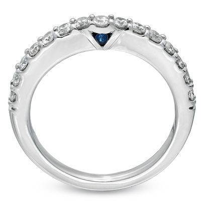 Love this Vera Wang wedding band with the hidden sapphire which is a symbol of faithfulness and everlasting love