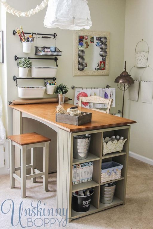 Make a craft table with a countertop mounted to bookcases, add trim and breadboard wallpaper to sides of bookcases