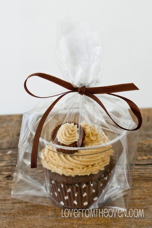 Need to package individual Cupcakes? Put them in a clear plastic cup, put the cup in a bag, tie with a ribbon and voila!