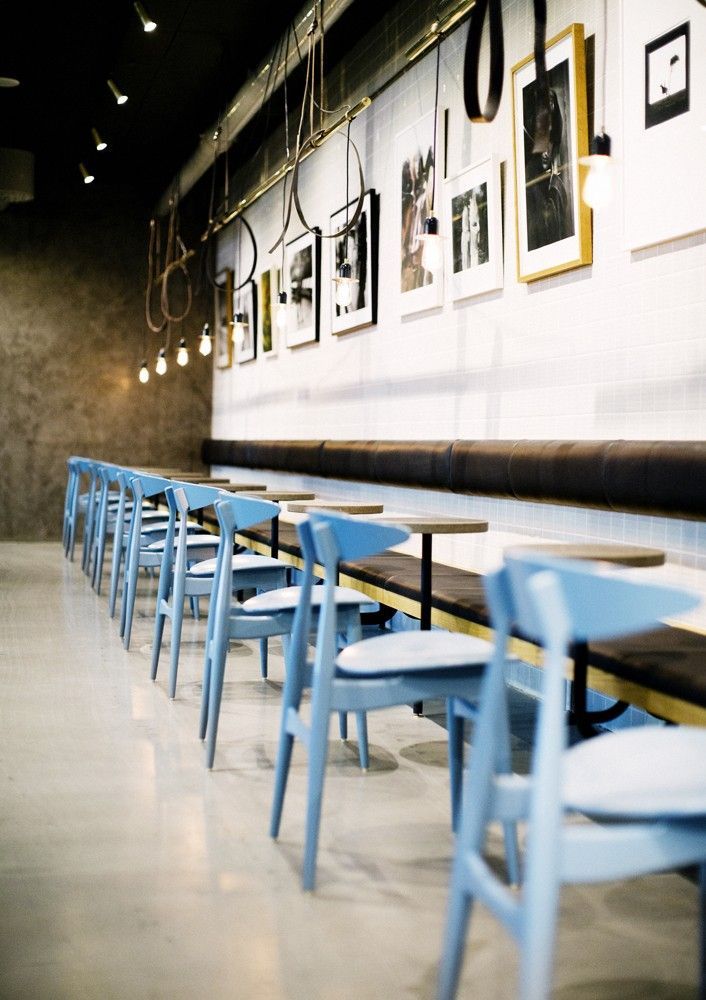 Printz Mathall, Stockholm, blue wooden chairs, white ceramic tiles, Rubn | Remodelista