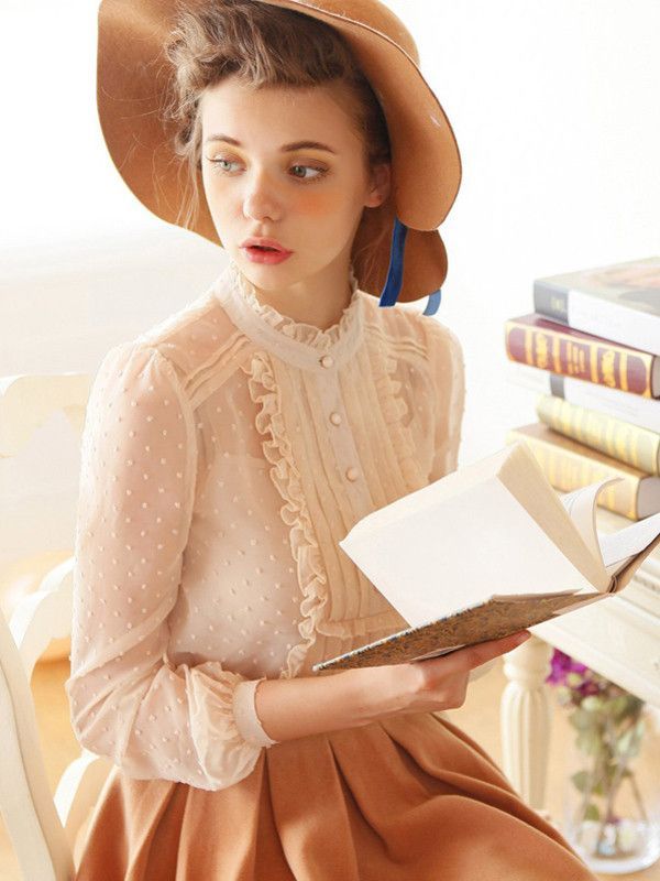 What a dainty sheer blouse!  It looks like something straight out of the Edwardian era.
