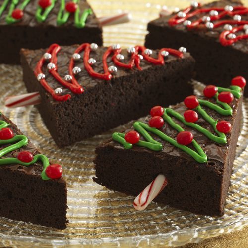 Brownies gone festive! To create these Christmas Tree Brownie Pops, prepare your favorite mix in a square baker and let cool