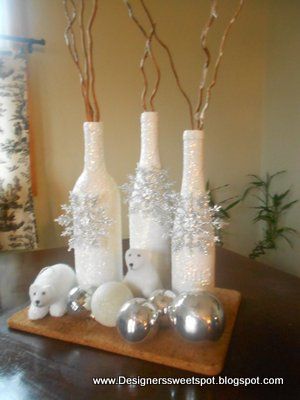 Cover Wine bottles with glue and roll in Epsom Salts.  Decorate with snowflake ornaments…