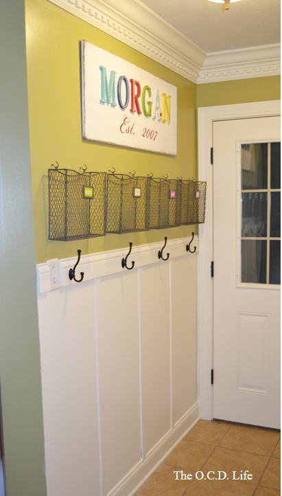 Creating a Family Command Center – love this idea ..all those school papers have a home! Viola!