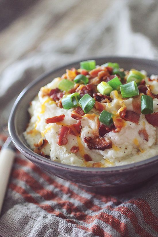Crockpot Cheesy Loaded Mashed “Potatoes” | Made from cauliflower, this recipe is only a surprising 55 calories!