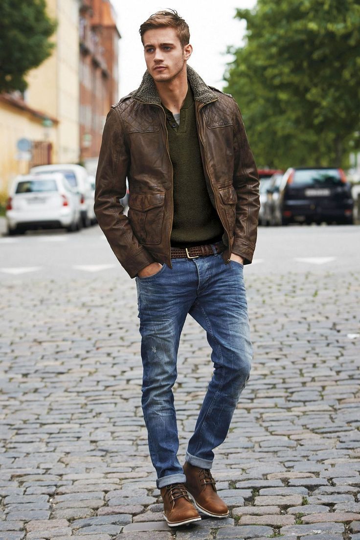 dark brown leather barn jacket, army wool sweater, brown boots. tan or camel jeans would be better. less groomed hair. raise