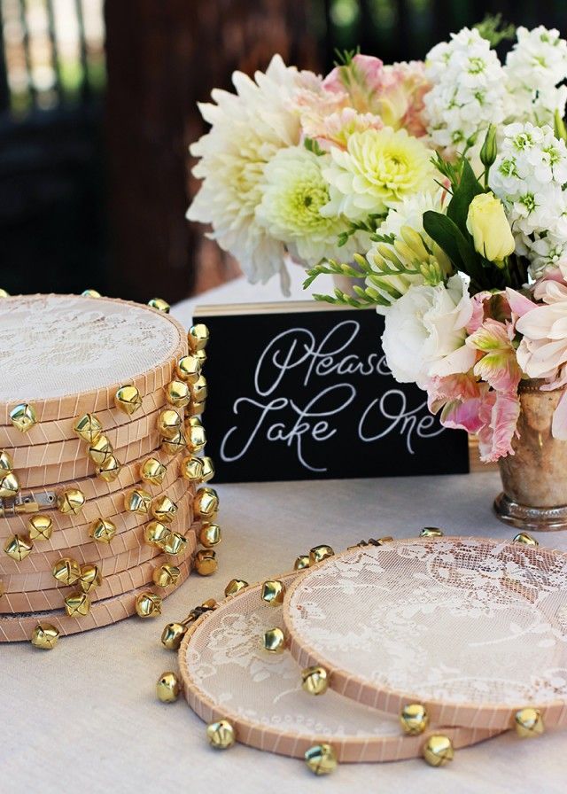 Handmade lace-tambourine favors welcome wedding guests on the sweetest note. #DIY