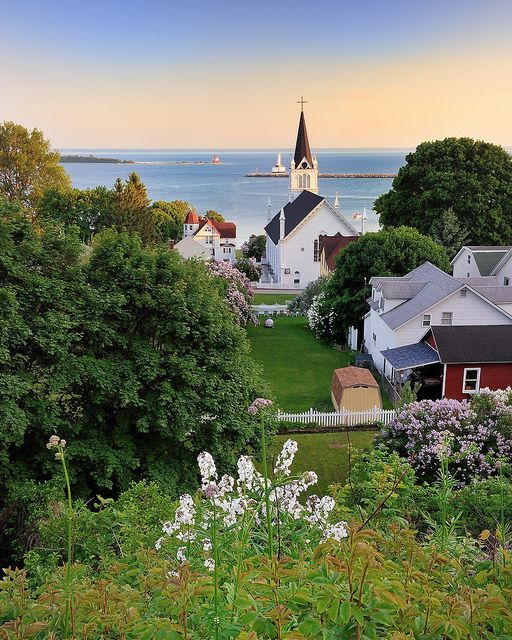 Mackinac Island, Michigan.  I love northern Michigan. You can breathe better up there.  But only summer visits, not sure I could