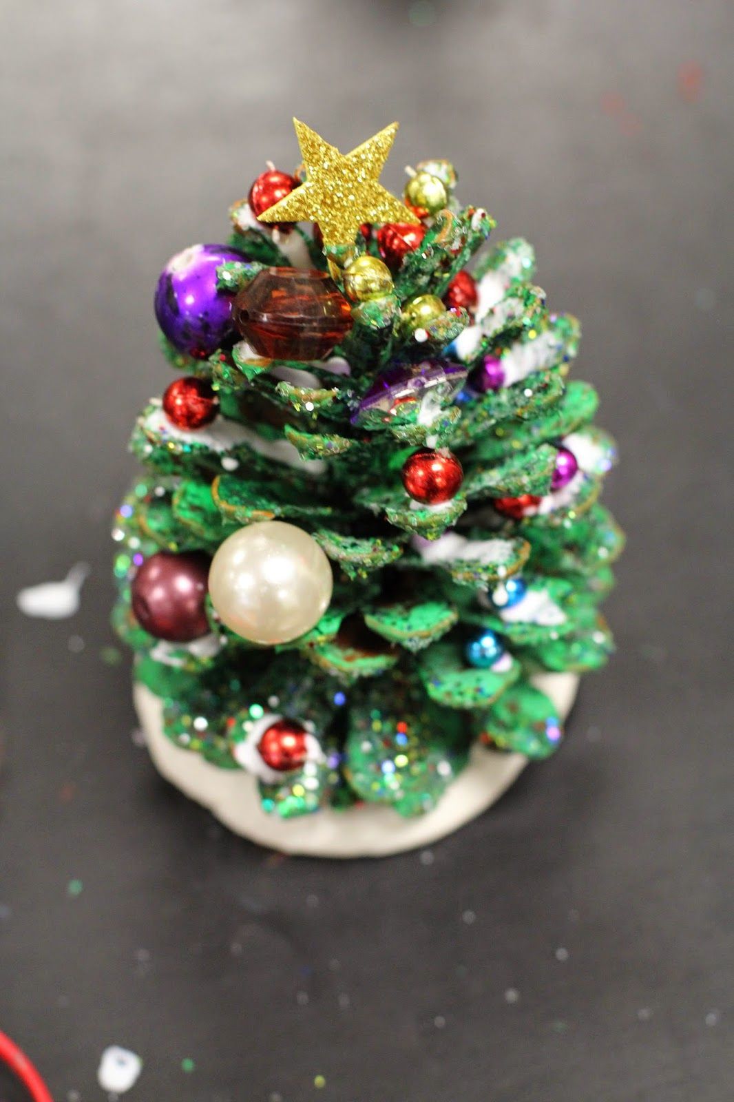 Pine Cone Trees!! I love this and while this tutorial is for Christmas, I think the kids will love it at any time!