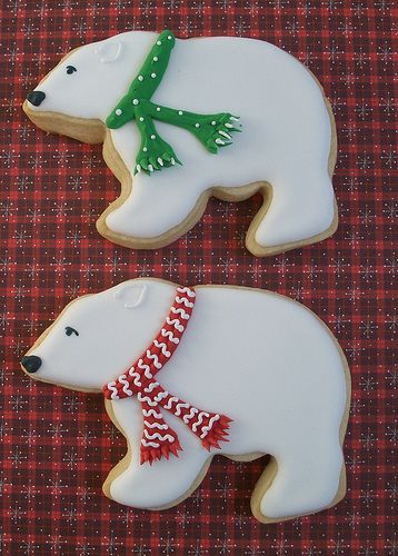 Polar bears with Christmas scarves decorated sugar cut-out cookies.