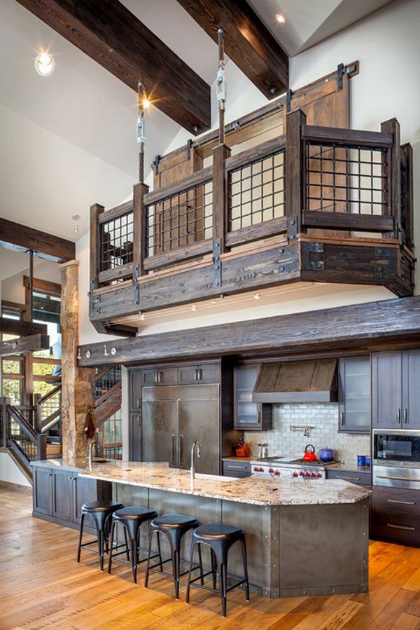 Rustic Kitchen and Railing – I like the pocket doors on the loft. Limits noise from traveling up.