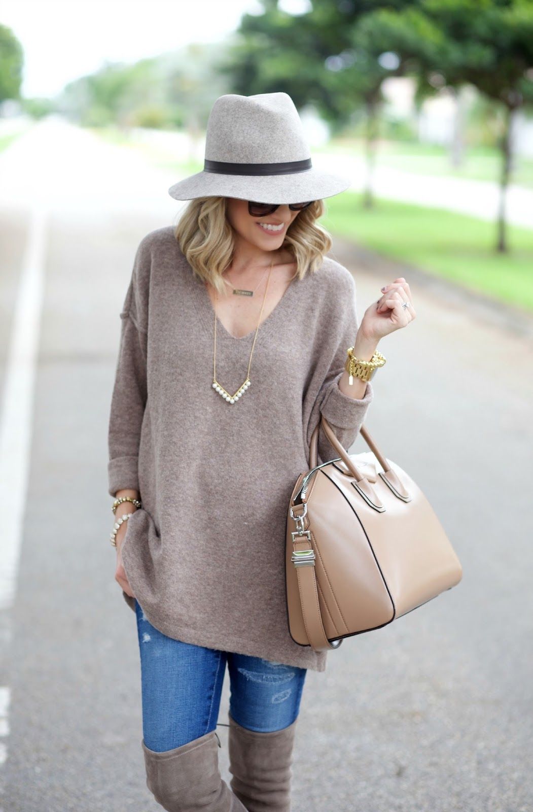 Oversized sweaters and over the knee boots Outfit.