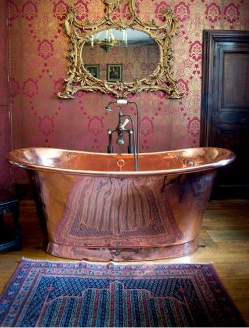 tudor copper bath from Athelhampton House a historical home in Dorset England.