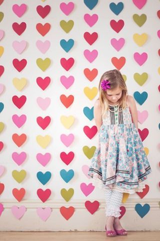 Valentine photo shoot – heart backdrop idea – a punch, some colorful cardstock and a sewing machine – DONE!