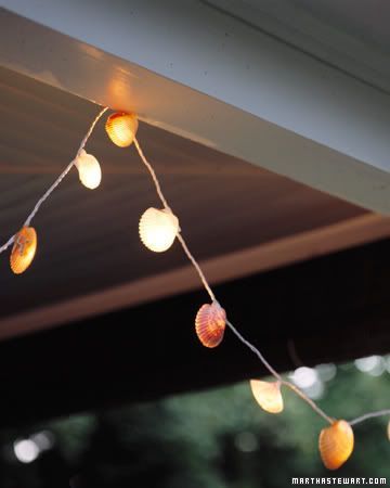 What a cleaver way to add a “theme” to outdoor decor.  Just take small shells and glue them to a string of white lights.  Results: