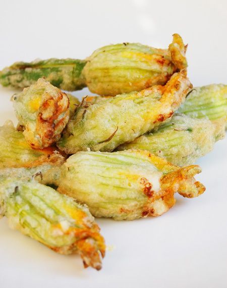 Zucchiniblossoms7_2 stuffed with ricotta and batter dipped. Delicious! My Grandma made these every summer from the garden. Awesome