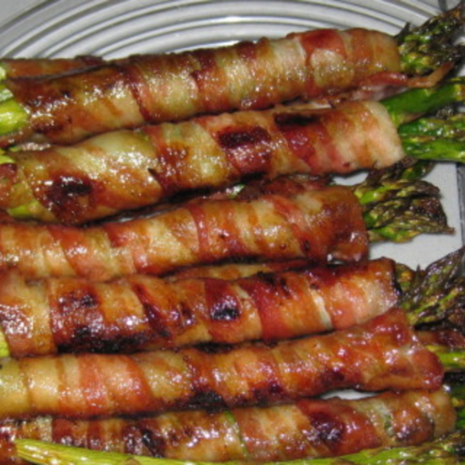 Bacon-Wrapped Asparagus – butter, brown sugar, garlic & soy sauce… Sounds heavenly!
