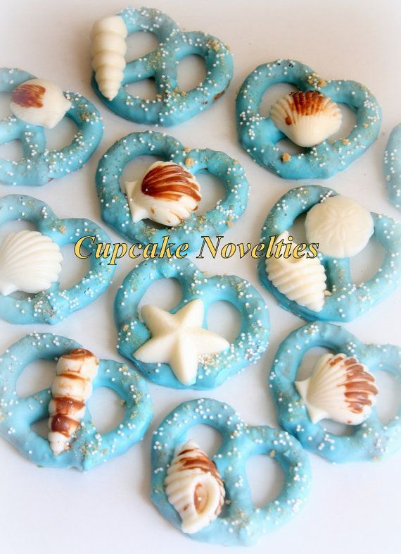 Buy online on Etsy! Elegant & delicious Seashell & Sand Dollar topped Chocolate dipped Pretzels! Great for a Beach Wedding, an