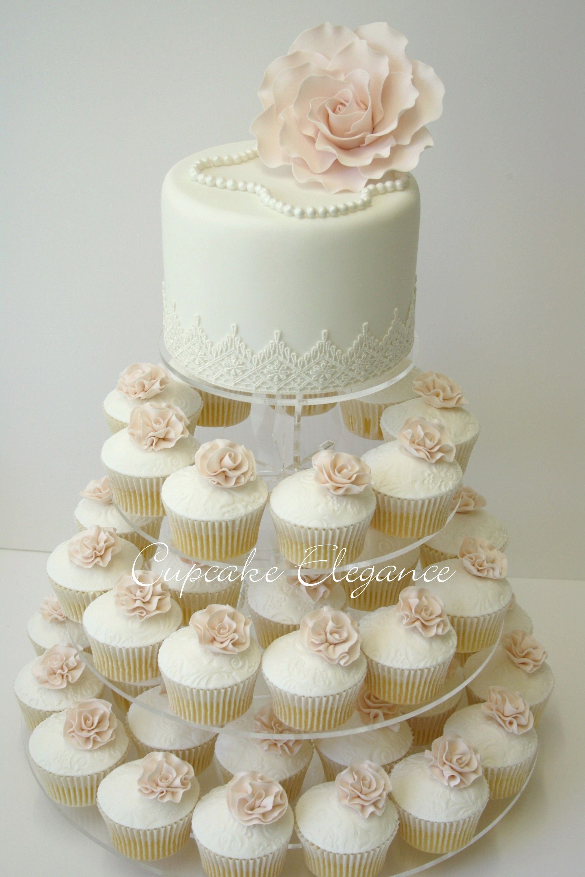 Cupcakes are fun!  But, this is great idea because you still have a wedding cake for your 1 year anniversary.