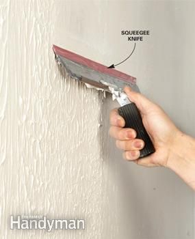 <strong>Step 3:</strong> Wipe it smooth -   How to skim coat to get rid of textured walls.