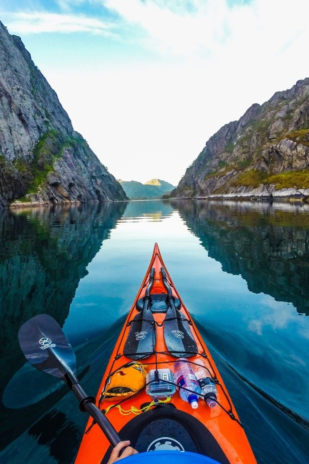 Kayaking in Trollfjorden, Lofoten Islands, Norway, during midnightsun by Tomasz Furmanek